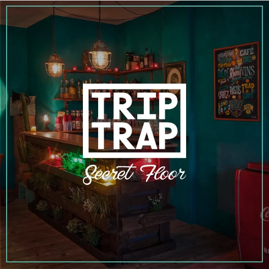 Intérieur chaleureux et mystérieux du Trip Trap Secret Floor aux Acacias, Genève