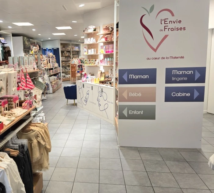 Intérieur de la boutique L'Envie de Fraises à Genève, spécialisée maman, bébé et enfant.